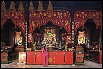 Woman at altar, Tam Son Hoi Quan Pagoda. Cholon, District 5, Ho Chi Minh City, Vietnam