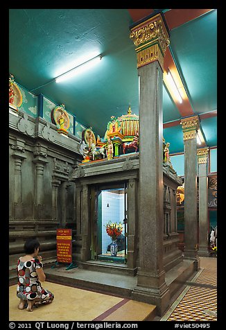 Worshipping inside Mariamman Hindu Temple. Ho Chi Minh City, Vietnam