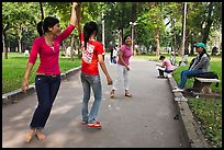 Young women practising dance, Cong Vien Van Hoa Park. Ho Chi Minh City, Vietnam (color)