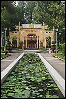 Lilly pond and temple gate, Van Hoa Park. Ho Chi Minh City, Vietnam