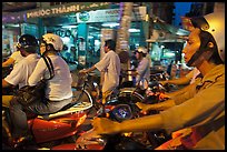 Motorcyle riders in traffic gridlock. Ho Chi Minh City, Vietnam (color)