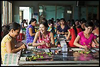 Productin of candy through manual labor, Ben Tre. Mekong Delta, Vietnam ( color)