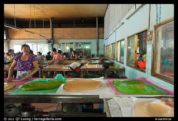Uncut coconut candy in factory. Ben Tre, Vietnam (color)