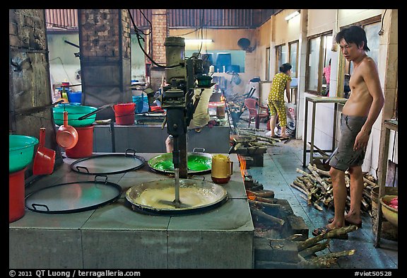 Pots in cococut candy factory. Ben Tre, Vietnam (color)