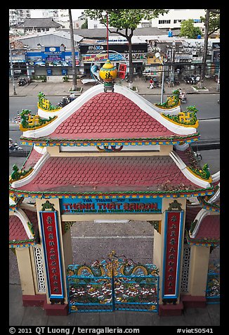Exterior gate and street from above, Saigon Caodai temple, district 5. Ho Chi Minh City, Vietnam (color)