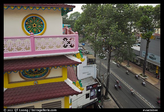 Front tower and street, Saigon Caodai temple, district 5. Ho Chi Minh City, Vietnam (color)