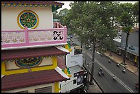 Front tower and street, Saigon Caodai temple, district 5. Ho Chi Minh City, Vietnam (color)