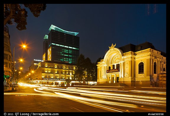 Opera house and streaks from traffic at night. Ho Chi Minh City, Vietnam (color)