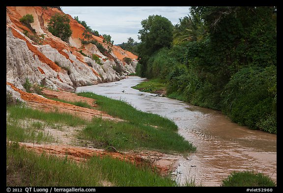 Fairy Stream passing through eroded sand and sandstone landscape. Mui Ne, Vietnam (color)