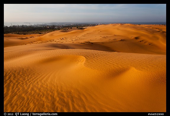 Mui Ne sand dunes, town in the distance. Mui Ne, Vietnam