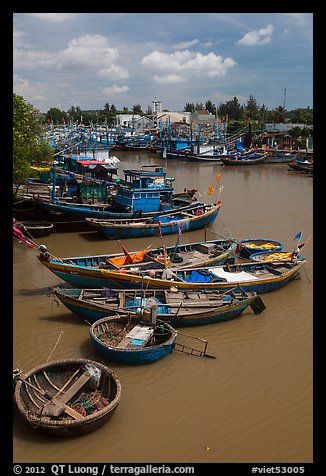 Fishing boats along river, Phan Thiet. Vietnam (color)