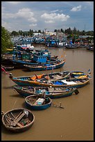 Fishing boats along river, Phan Thiet. Vietnam ( color)