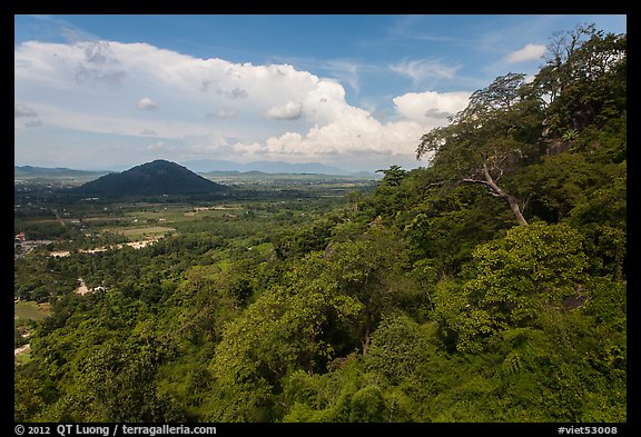 Mountain forest and plain dotted with hills. Ta Cu Mountain, Vietnam