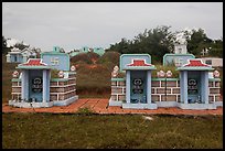 Mix of Buddhist and Christian tombs. Mui Ne, Vietnam (color)