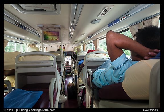 Inside bus with reclining seats for sleeping. Vietnam