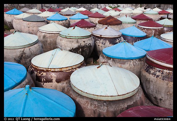 Amphorae of fish sauce. Mui Ne, Vietnam (color)