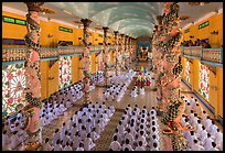 Noon ceremony inside Cao Dai Holy See temple. Tay Ninh, Vietnam (color)