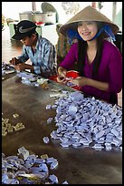 Villagers wrapping coconut candy, Phoenix Island. Mekong Delta, Vietnam ( color)