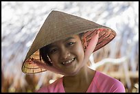 Portrait of girl with conical hat, Phoenix Island. Mekong Delta, Vietnam ( color)