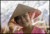 Portrait of girl with conical hat, Phoenix Island. My Tho, Vietnam (color)