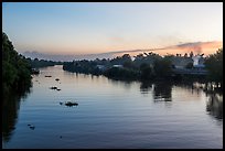 River and homes at sunset. Mekong Delta, Vietnam ( color)