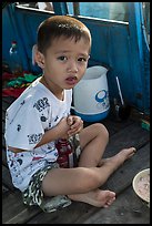 Boy on barge. Can Tho, Vietnam (color)