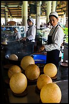 Crispy spherical shells beeing prepared. Mekong Delta, Vietnam (color)