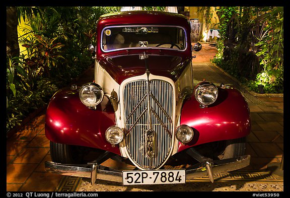 Old Citroen car in garden. Ho Chi Minh City, Vietnam