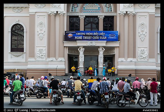 Tradionnal music performance outside municipal opera house. Ho Chi Minh City, Vietnam (color)