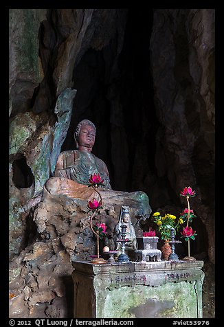 Altar and Buddha statue in grotto. Da Nang, Vietnam (color)