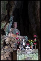 Altar and Buddha statue in grotto. Da Nang, Vietnam ( color)