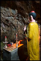 Buddha statue in narrow cave, Marble Mountains. Da Nang, Vietnam ( color)