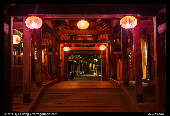 View through the inside of Covered Japanese Bridge at night. Hoi An, Vietnam