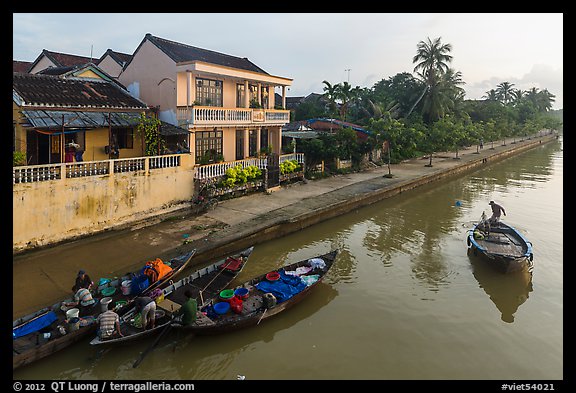 Waterfront with people selling from boats. Hoi An, Vietnam (color)