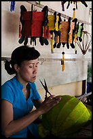 Woman working on paper lantern. Hoi An, Vietnam ( color)