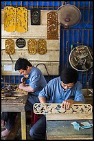 Wood carving workshop. Hoi An, Vietnam (color)