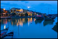 Waterfront, boats, and Thu Bon River at dusk. Hoi An, Vietnam ( color)