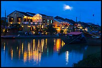 Moonrise over houses and river. Hoi An, Vietnam ( color)