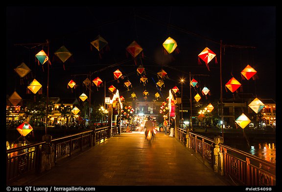 Cam Nam bridge with lighted lanterns at night. Hoi An, Vietnam (color)