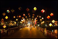 Cam Nam bridge with lighted lanterns at night. Hoi An, Vietnam (color)