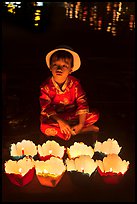 Boy with candle lanterns for sale. Hoi An, Vietnam (color)