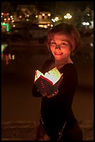 Young woman with candle box. Hoi An, Vietnam ( color)