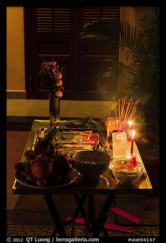 Curbside altar at night. Hoi An, Vietnam