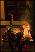 Curbside altar at night. Hoi An, Vietnam ( color)