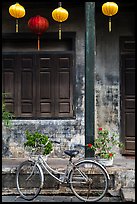 Bicycle and facade with lanterns. Hoi An, Vietnam (color)