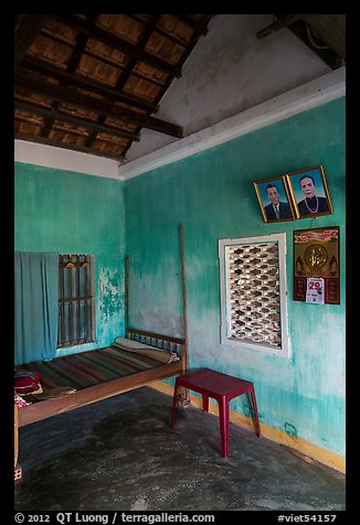 Village home with ancester pictures. Hoi An, Vietnam