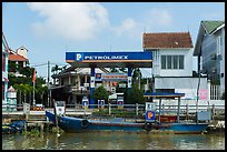 Road and river petrol station. Hoi An, Vietnam (color)