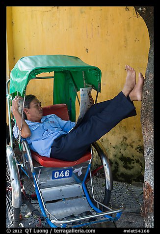 Cyclo driver relaxing. Hoi An, Vietnam (color)