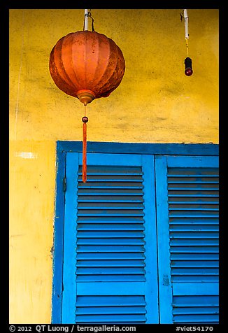 Paper lantern, wall, and blue shutters. Hoi An, Vietnam (color)