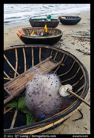 Coracle boats with fishing gear. Da Nang, Vietnam (color)